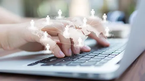 Closeup of business woman hand typing on laptop keyboard